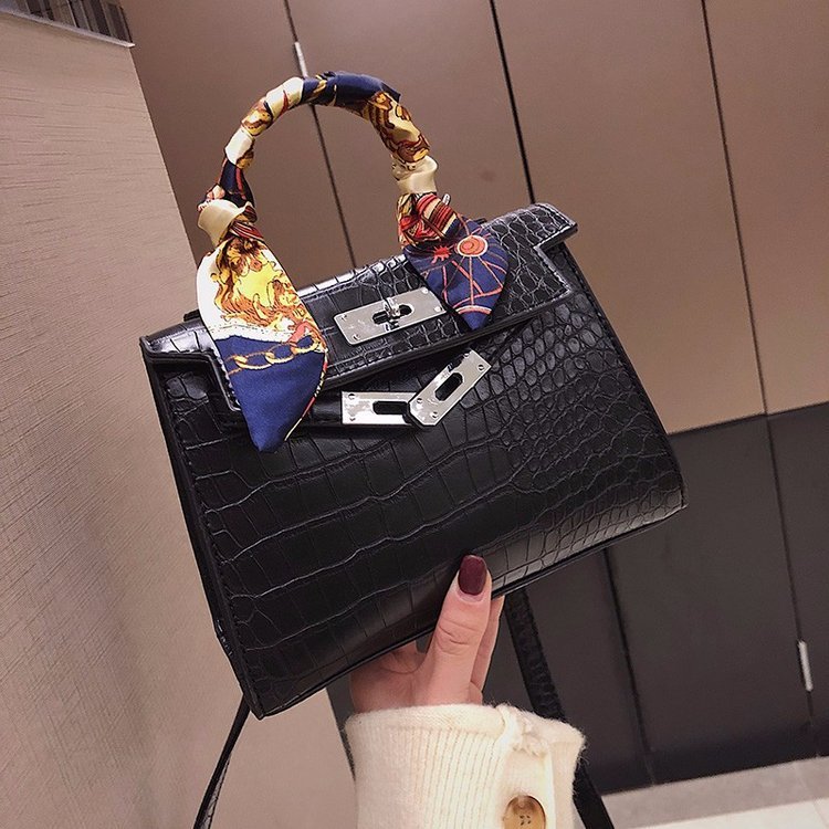 A Cross-Body Bag with a Stone Design