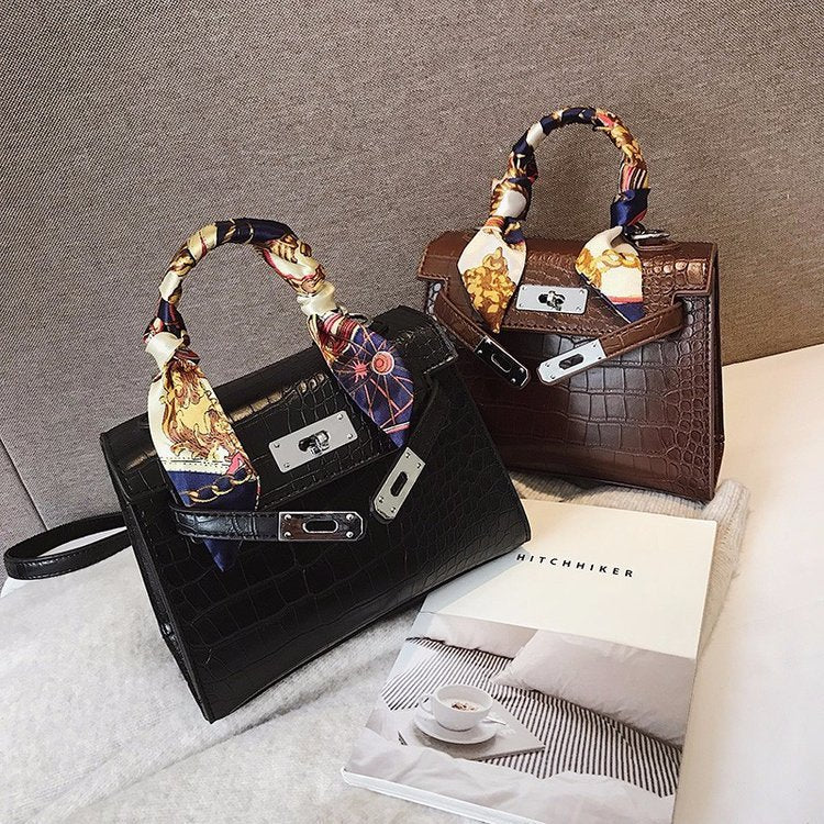 A Cross-Body Bag with a Stone Design