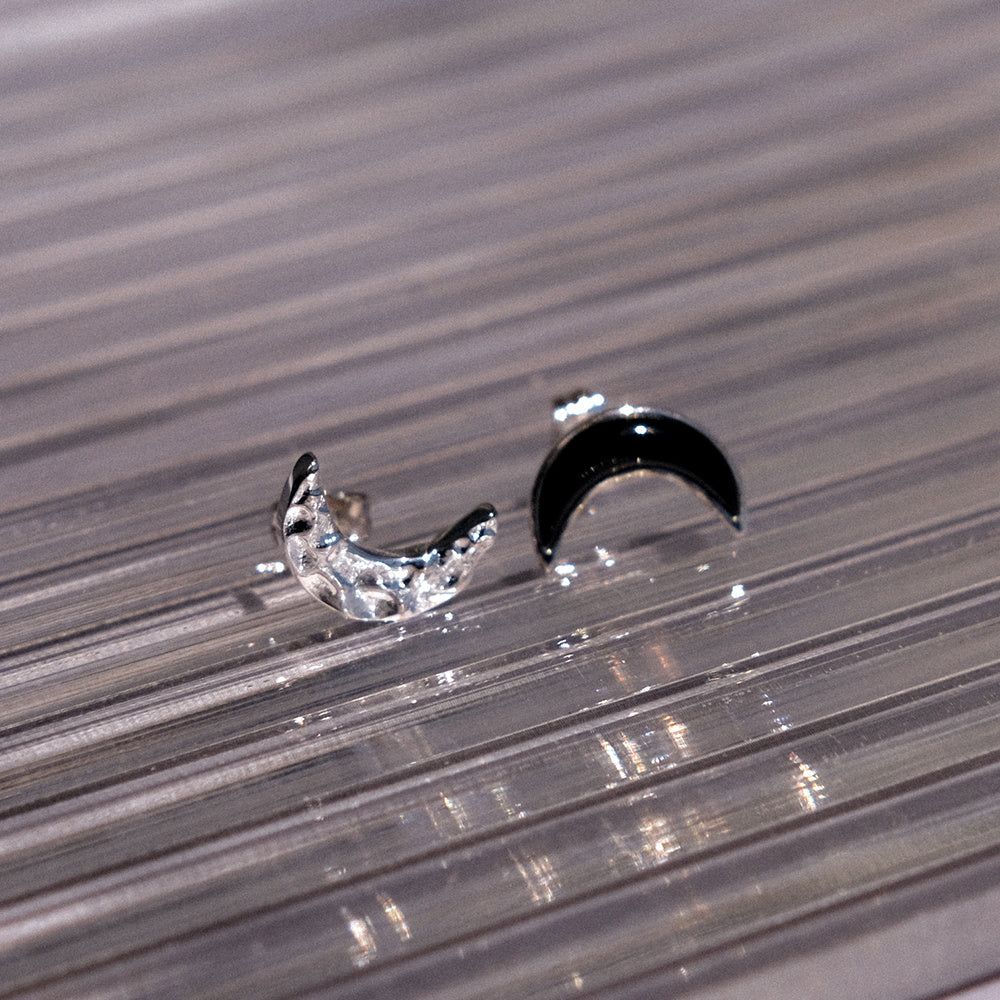 A Pair Of Asymmetrical Moon Earrings