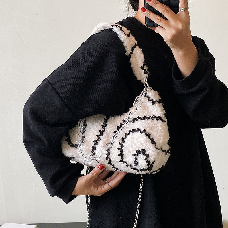 The Fashion Trend Is A One Shoulder Crossbody Bag