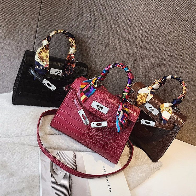 A Cross-Body Bag with a Stone Design