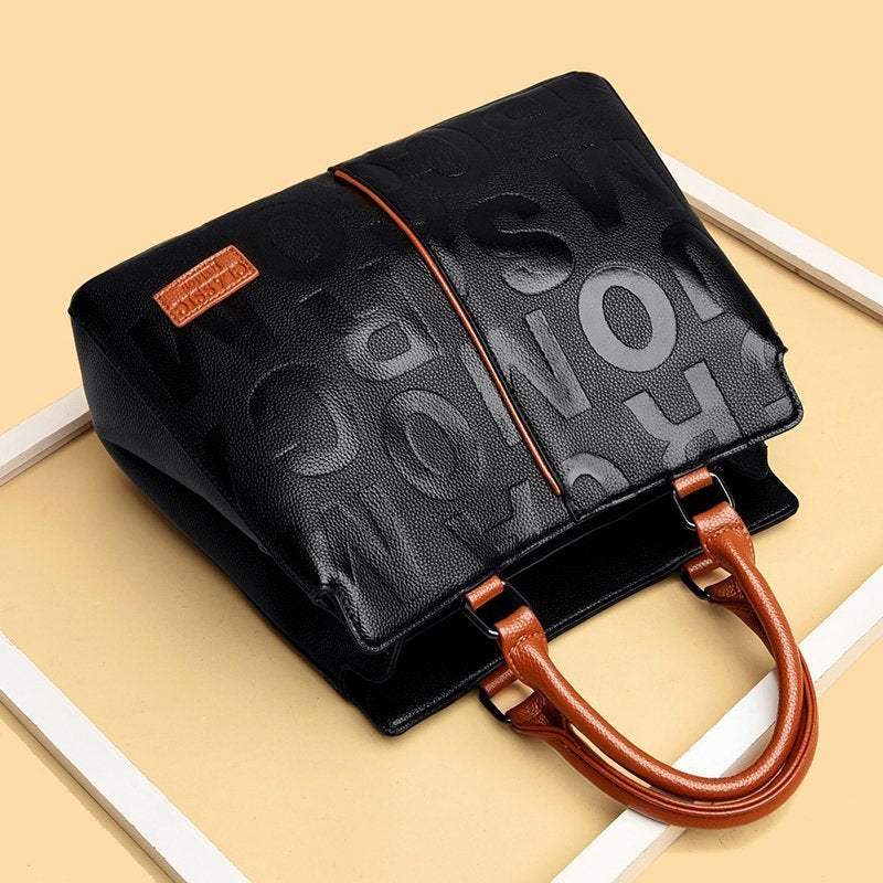 A Versatile Monogrammed Shoulder Bag For Women