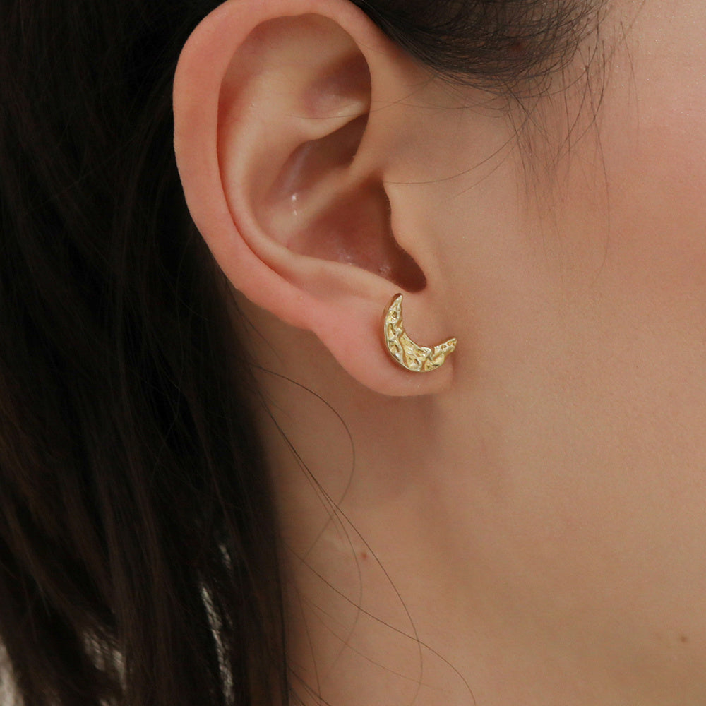 A Pair Of Asymmetrical Moon Earrings
