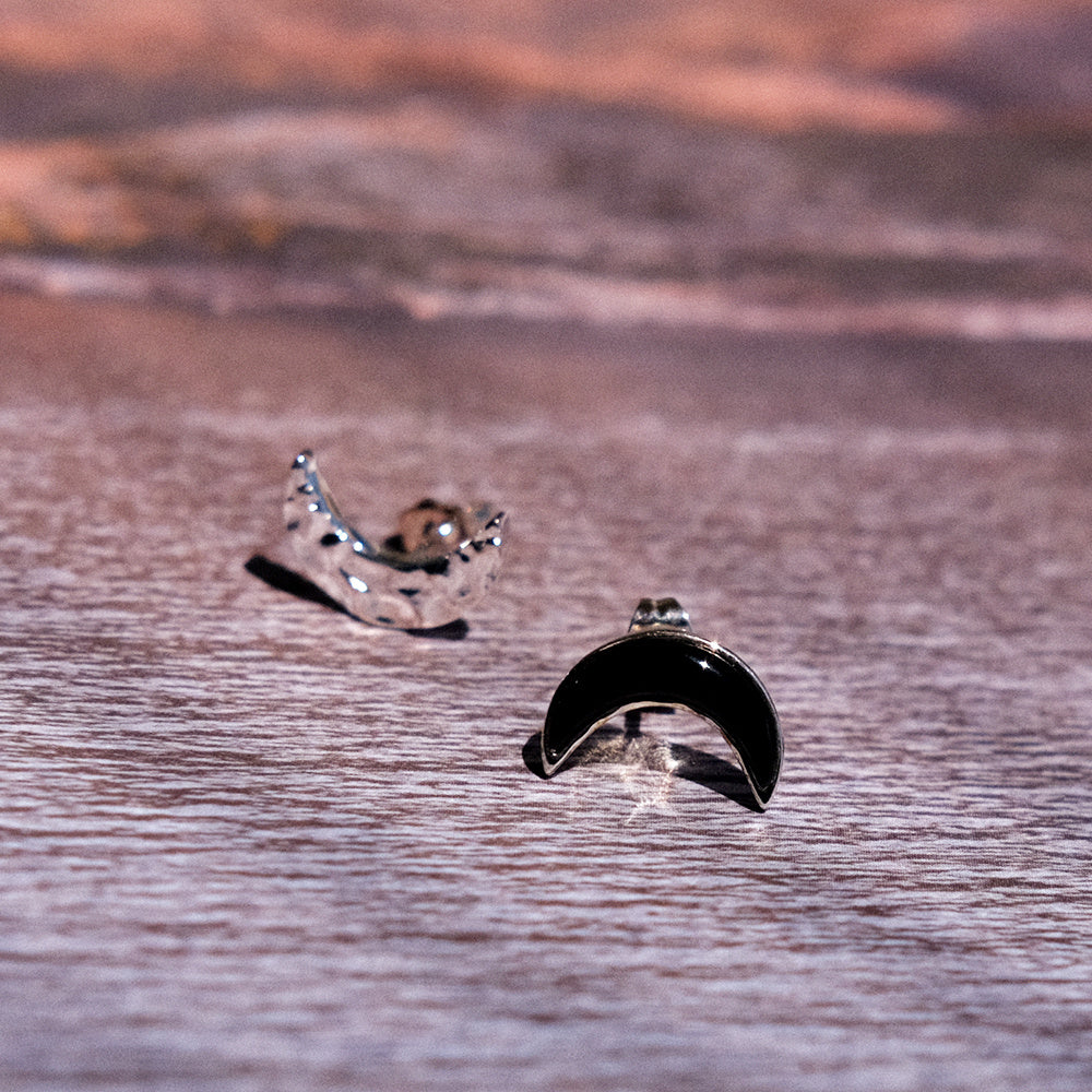 A Pair Of Asymmetrical Moon Earrings