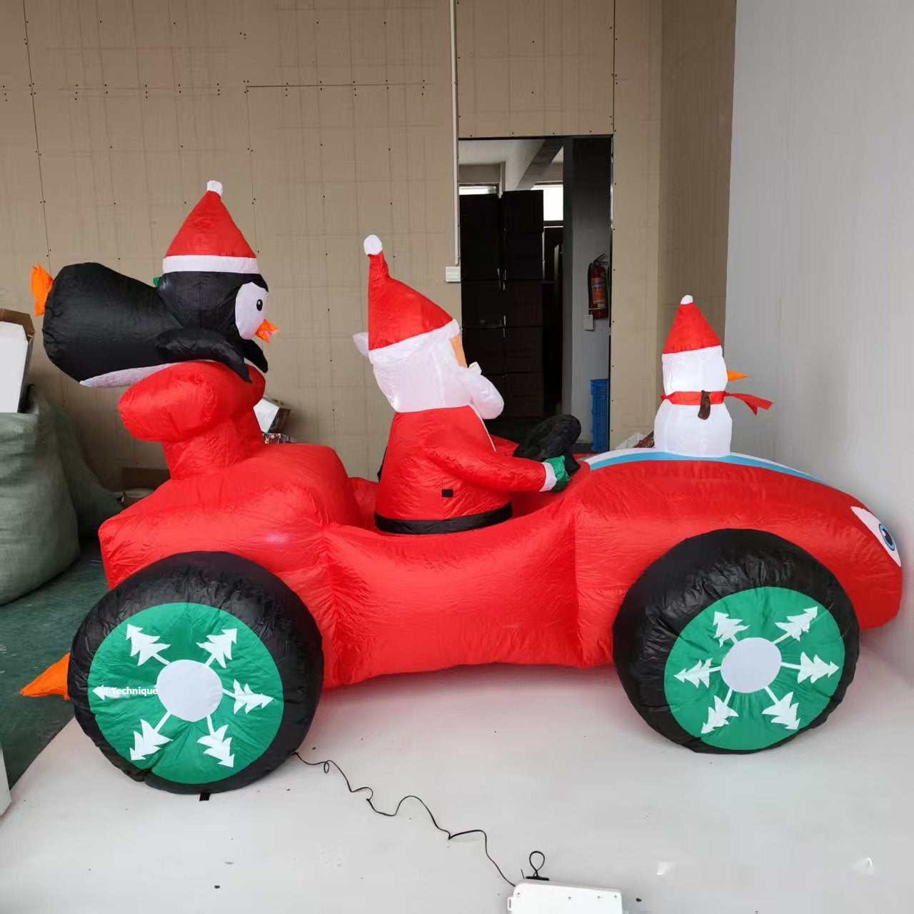 Old Man Driving A Racing Penguin Combo Christmas Inflatable