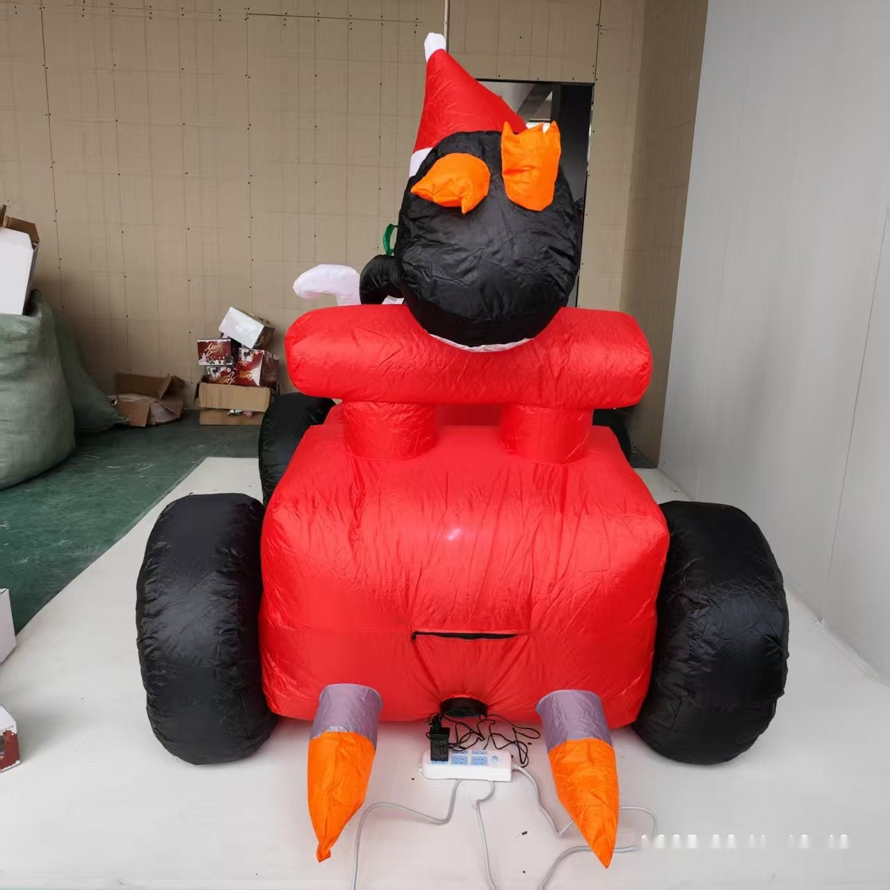 Old Man Driving A Racing Penguin Combo Christmas Inflatable