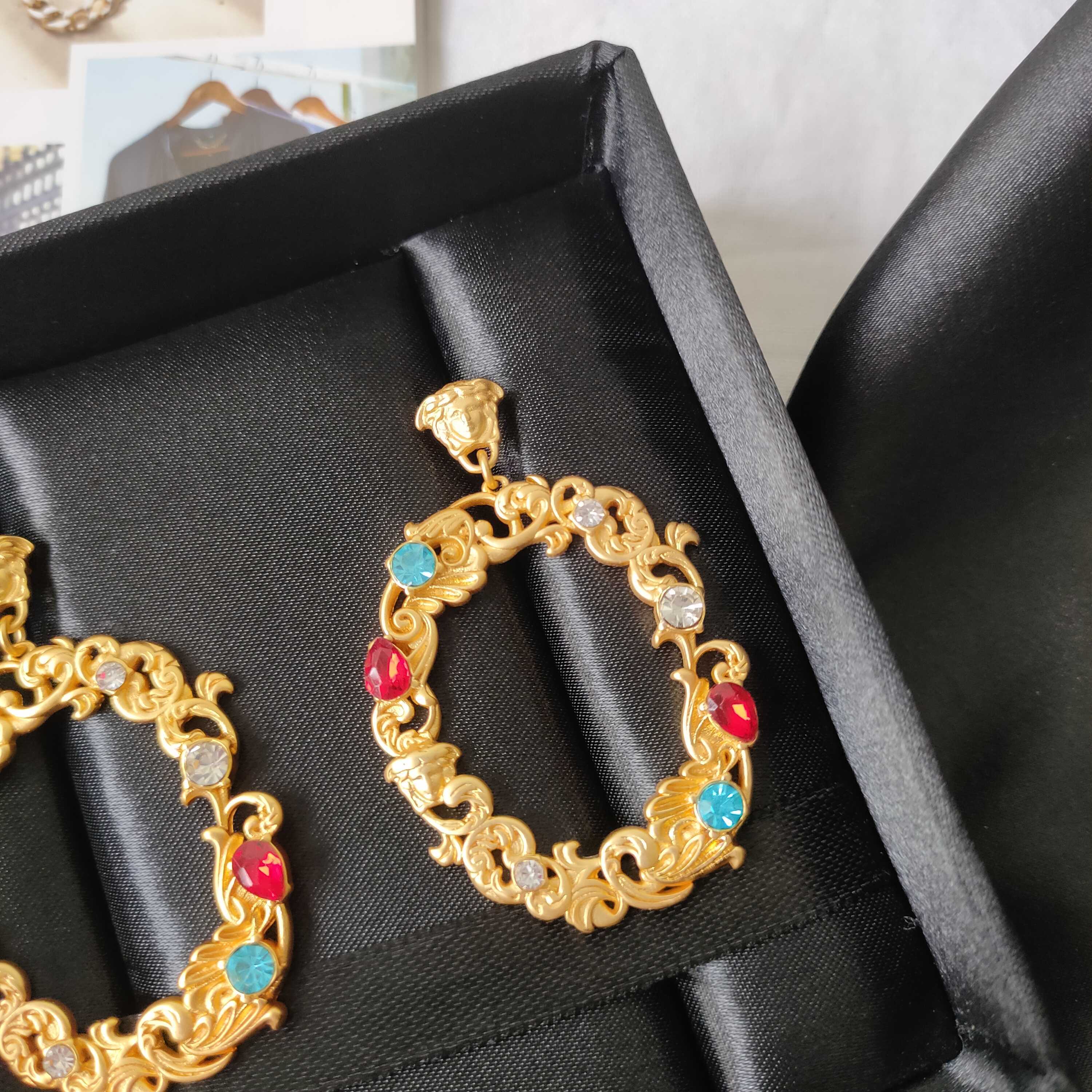 Human Head Medusa Fancy Diamond Flower Vine Earrings