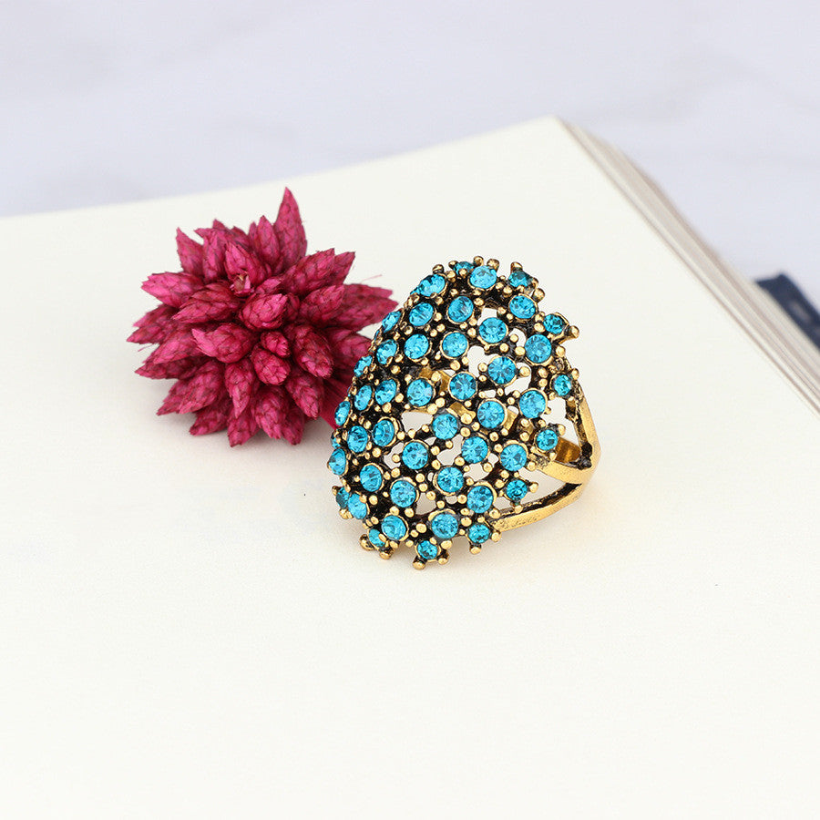 Dense Four-Prong Black Diamond Ring