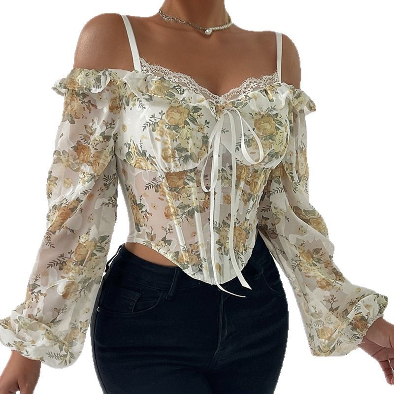 A Figure-Hugging Top With A Floral Print, Featuring A Fishbone Design