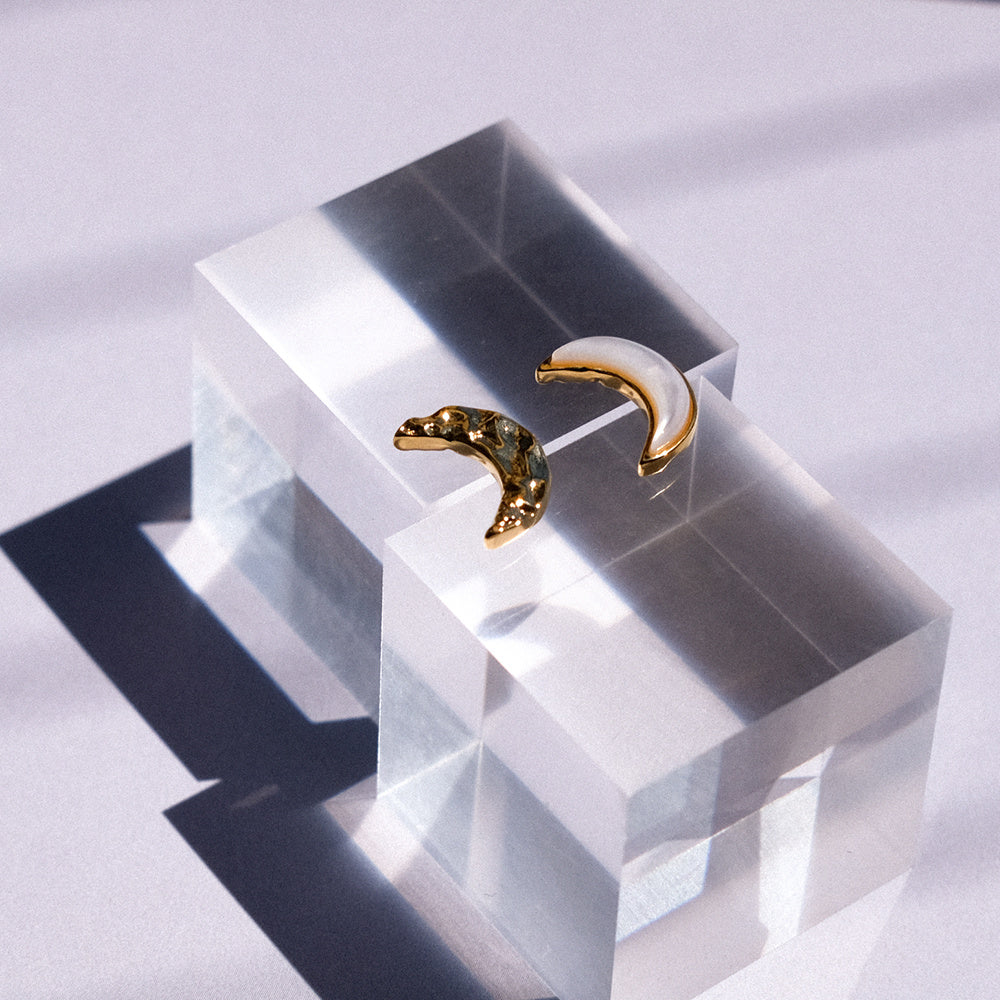 A Pair Of Asymmetrical Moon Earrings