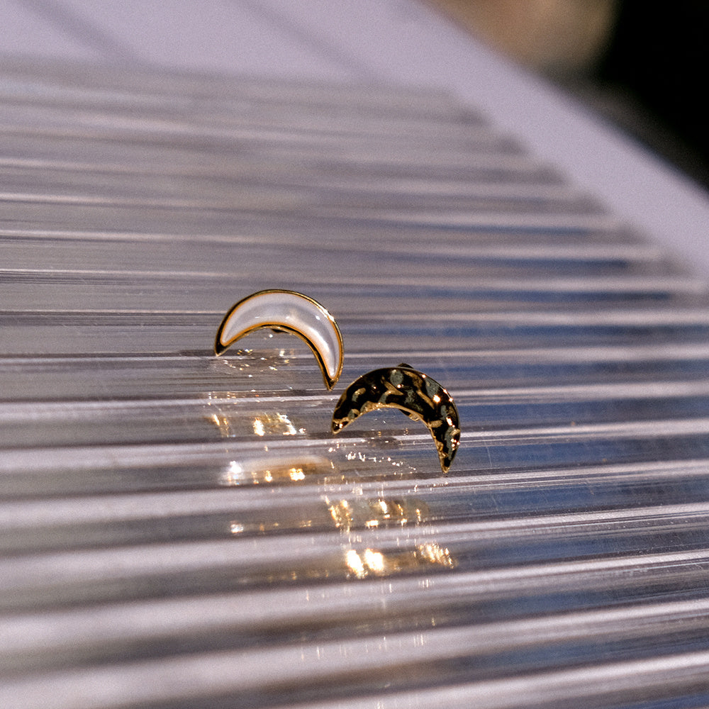 A Pair Of Asymmetrical Moon Earrings
